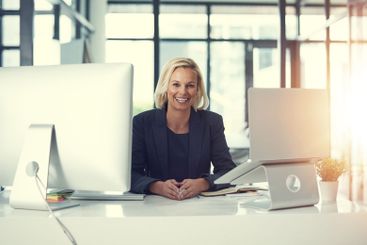 Happy, business woman and portrait with computer at...