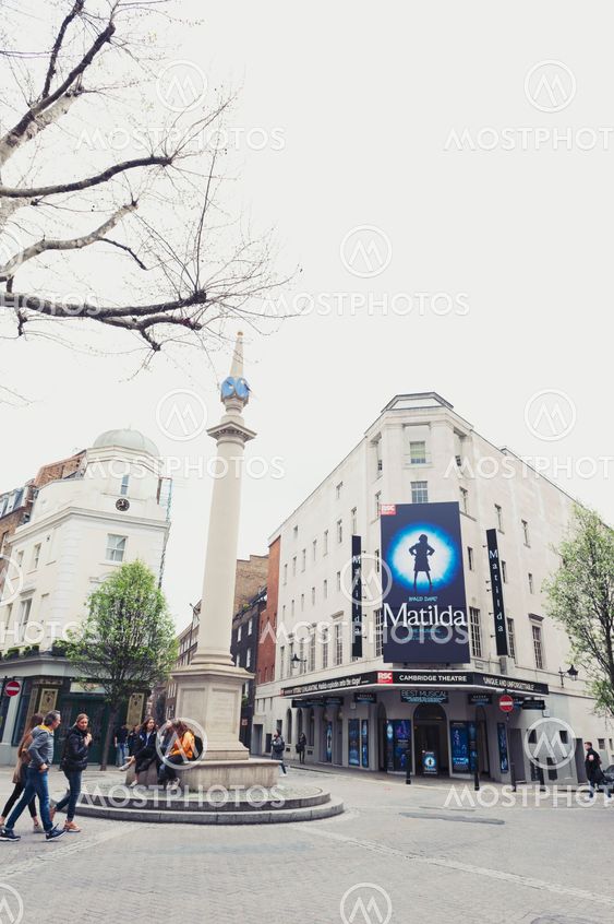 London, UK - April 2018: A sundial pillar supported by high Doric column erected at Seven Dials, a small road junction in Covent Garden in the West End of London where seven streets converge
