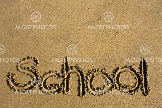 Message says "school" in the Sand on a Beach