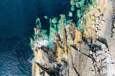 Aerial view of rough rocky shore along famous Ring of...