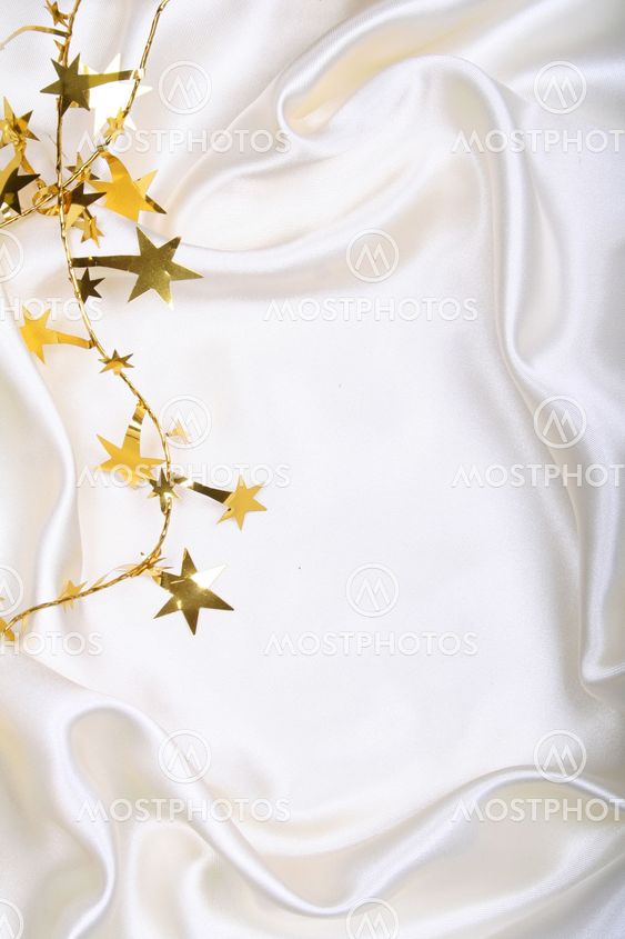Golden stars and spangles on white silk