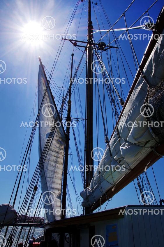 Sailing boat on sunset