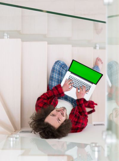 freelancer in bathrobe working from home