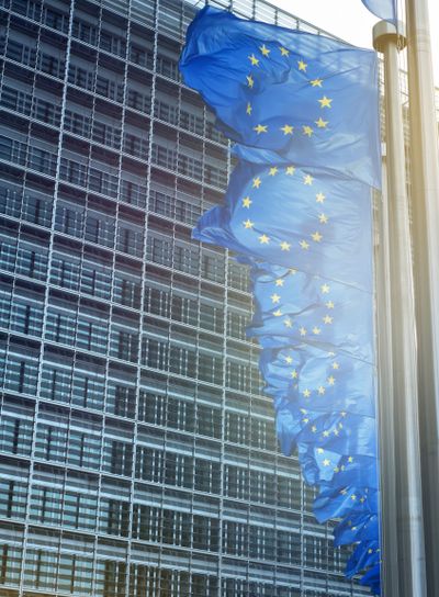 European Union flags in front of the Berlaymont