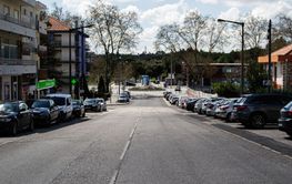 Urban street view in Fatima Portugal with parked cars and...