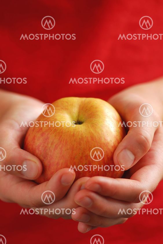Apple in hands