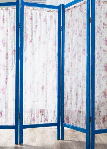 Blue wooden decorating screen with textile panels