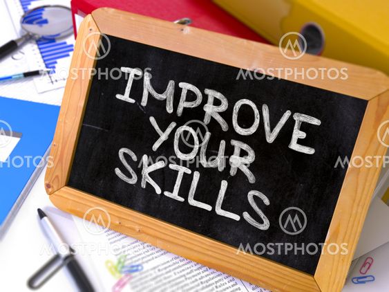 Improve Your Skills. Motivation Quote on Chalkboard.