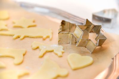 Freshly cut out Christmas cookies before baking