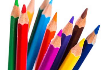 Vibrant assortment of colored pencils arranged in an...