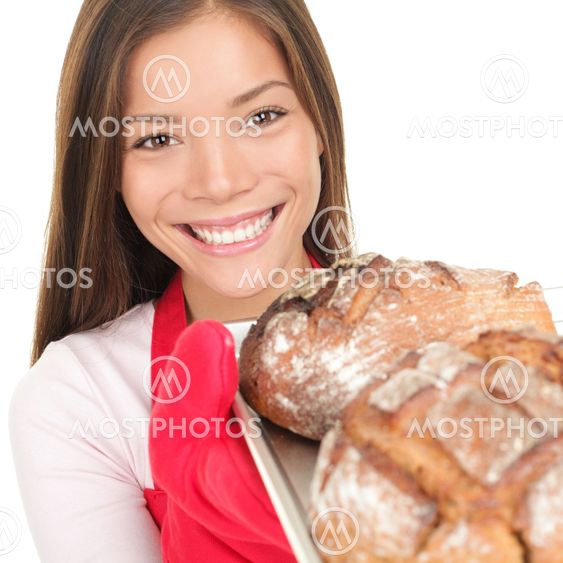 Woman showing fresh baked bread