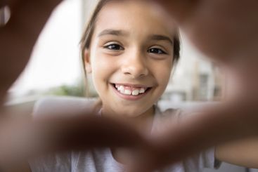 Close up webcam view beautiful face of little Hispanic girl