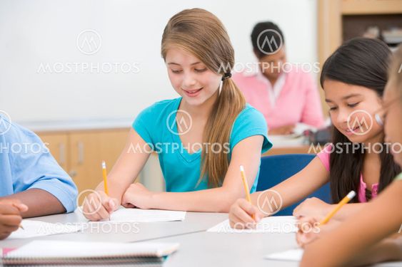 Elementary school pupils in classroom
