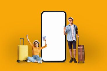 Young travelers with smartphone mockup, yellow wall