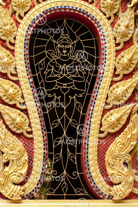 the gold stucco design of native thai style on the Wall