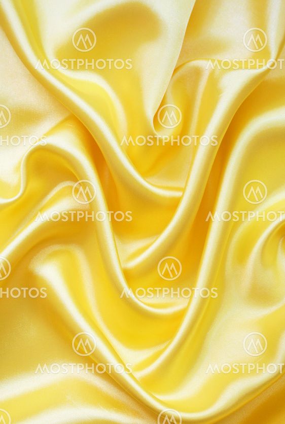 Smooth elegant golden silk as background