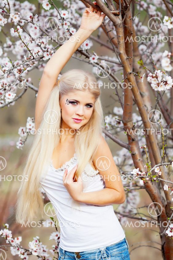 Girl in blossom garden