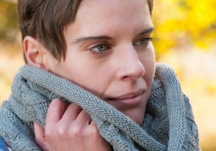 Attractive woman with grey scarf