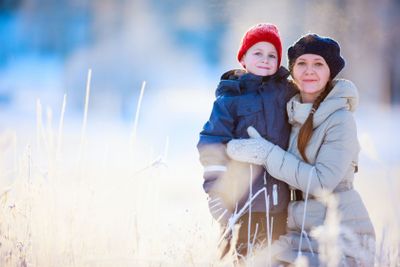 Mother and son outdoors at winter