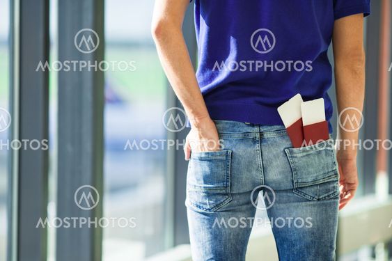 Closeup passports and boarding pass at airport indoor