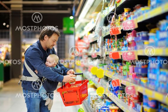 Father and his son at supermarket