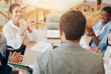 Business, meeting and people with celebration applause...