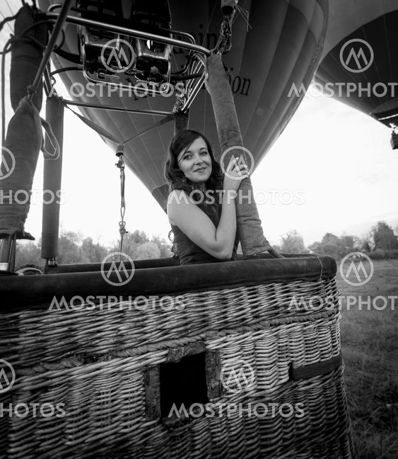 portrait of beautiful sexy woman posing at hot air...