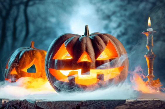 Halloween pumpkins on blue background