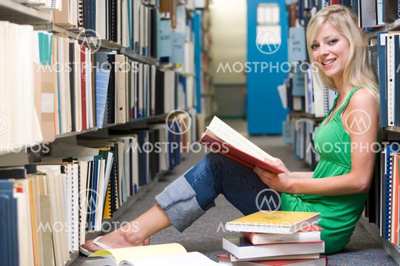 University student working in library