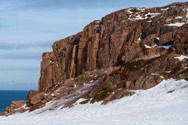 Red rocks on a sunny March day. Teriberka