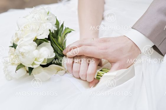 Bride and groom's hands