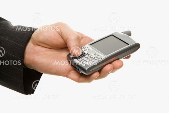 Businessman using PDA.