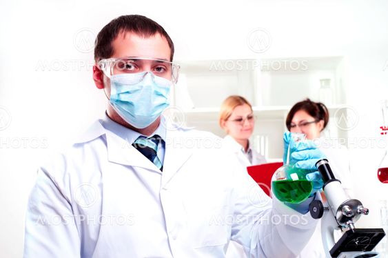 portrait of a chemist in protective mask