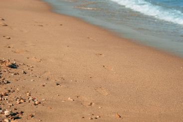 Beautiful seaside landscape with sea waves splashing the...