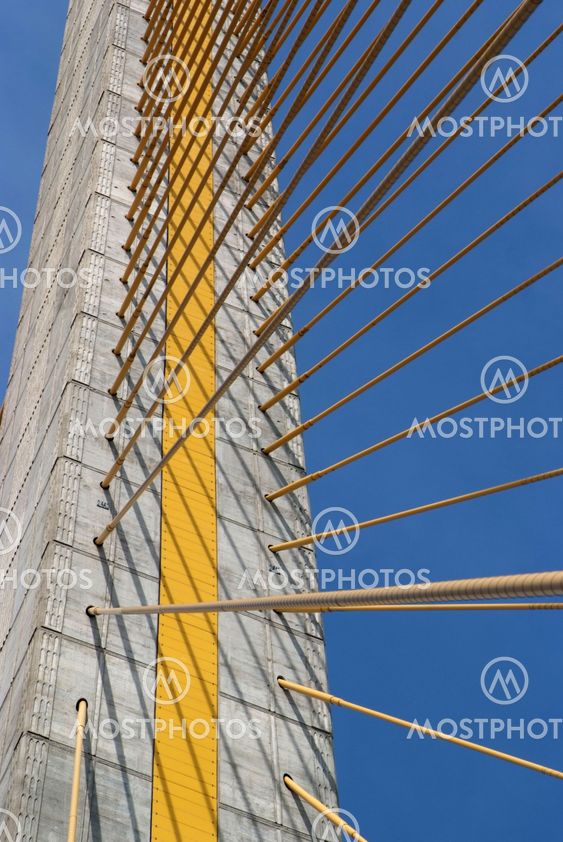 Detail of bridge construction over blue sky