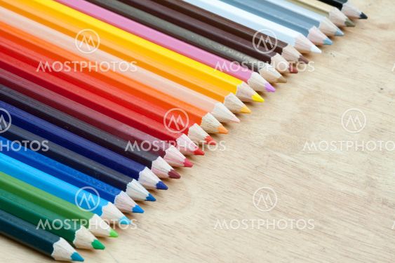 A lot of wooden pencils on wood