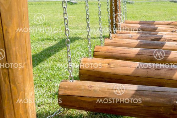 childrens bridge made of logs and chains