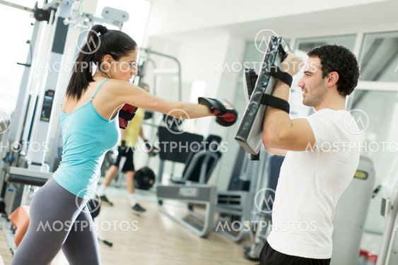 Young woman training in the gym