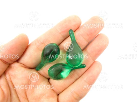 Hair vitamin serum capsule on hand
