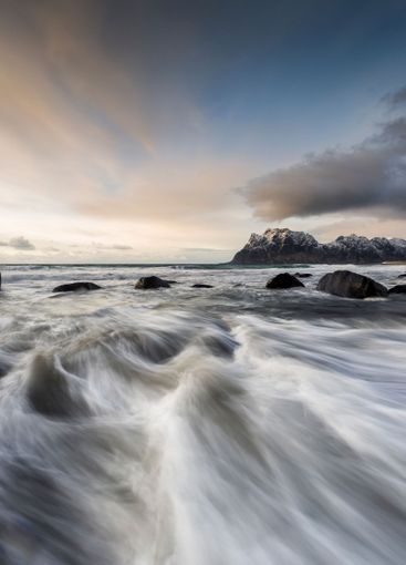 Clouds above beach in Norway