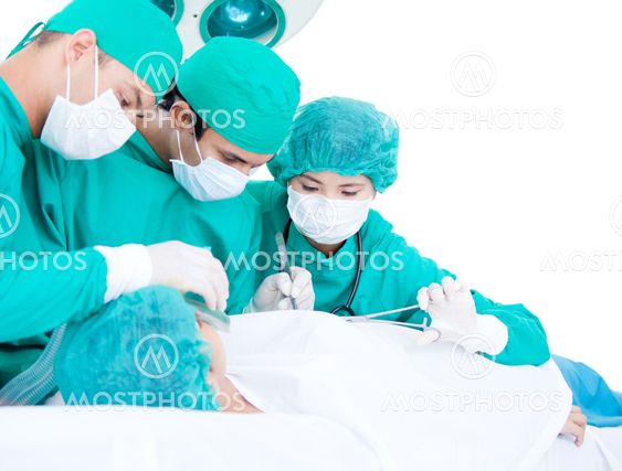 Medicalteam making an operation using surgery equipment on a patient