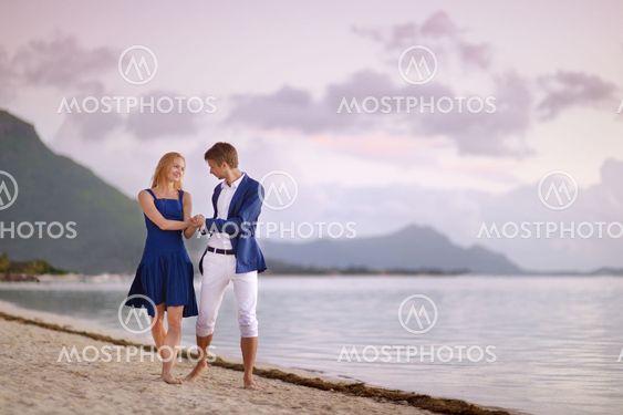 Beautiful romantic couple on a tropical beach