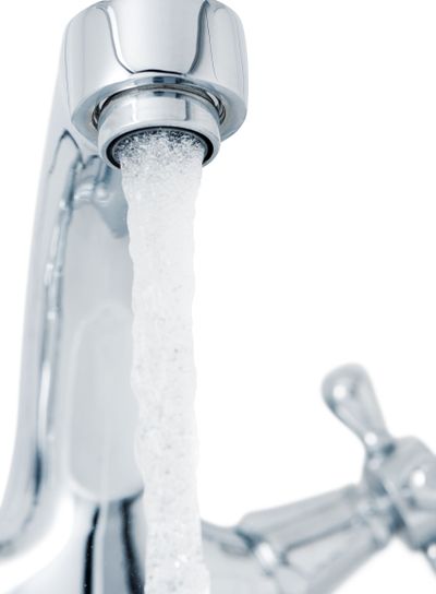 Water tap with a water stream.