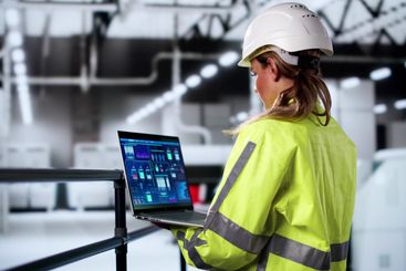 Woman Using Factory Scada Control Technology