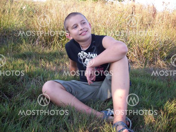 Brave smiling kid looking
