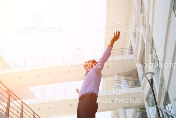 indian male business man celebrating success