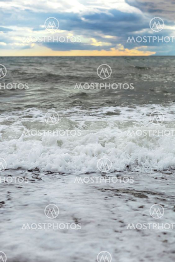 Sea or ocean cloudy sky wave after storm. Space for text.