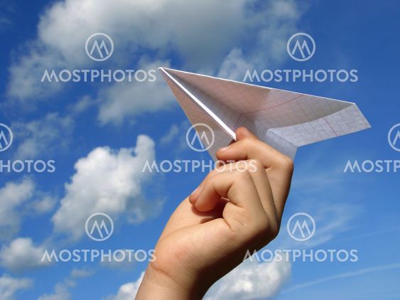 child hand with paper plane