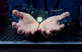 AI Assistant. Businessmen's hands hold virtual graphics...