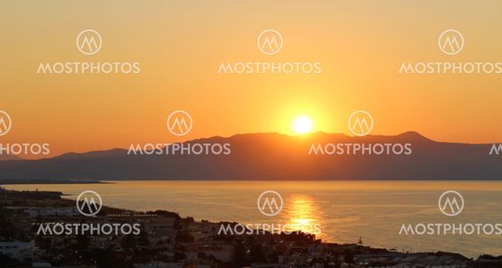 Solnedgång över Platanias